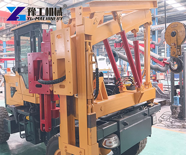 Wheeled hydraulic guardrail pile driver